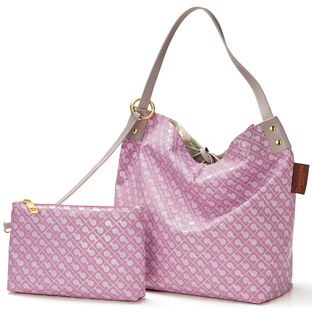 エナメル素材のリバーシブルワンハンドルバッグ／ポーチ付き