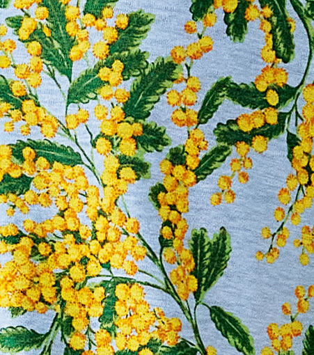 咲き誇るミモザ柄が艶やかなリネン混ジャージー。